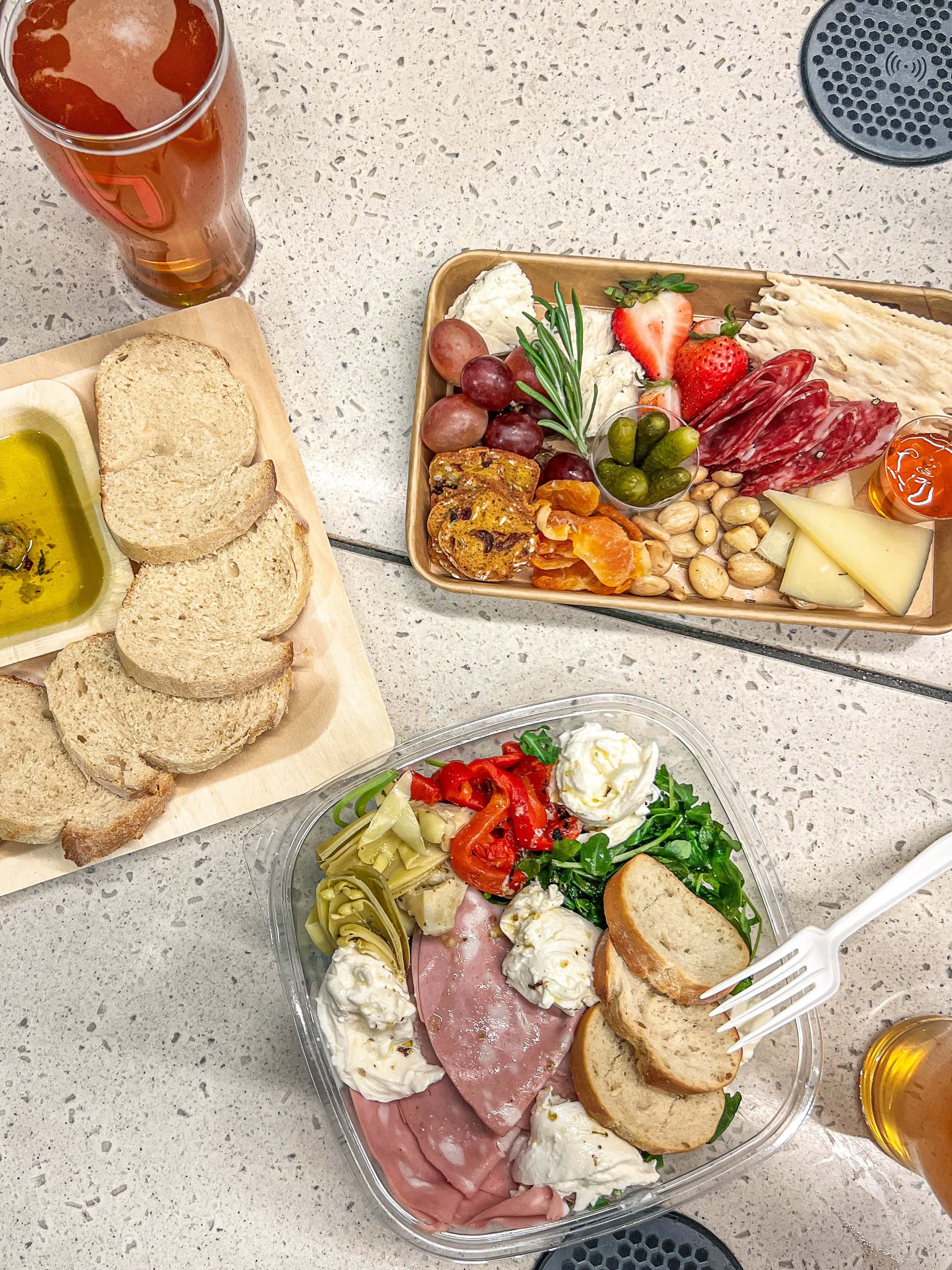 Eating Lunch at MG - a Burrata bowl, Lunch Graze, Olive oil dip, and beer from Fullsteam 